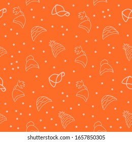 Vector background. Seamless pattern with winter hat. Warm winter hat in doodle style. Vector hand drawn illustration