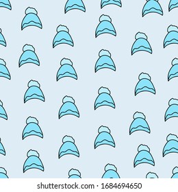 Vector background. Seamless pattern with winter hat. Warm winter hat in doodle style. Vector hand drawn illustration