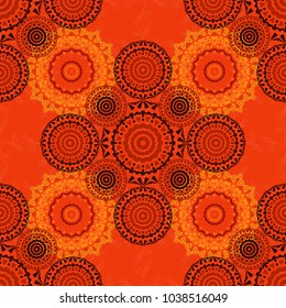 Vector background - symmetric seamless pattern design in red, brown and orange tones. Geometric kaleidoscope mandala.