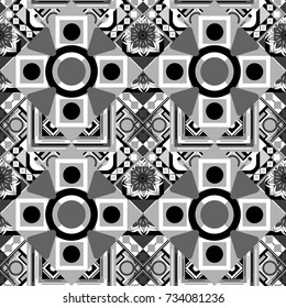Vector background with tiles and rhombus. Vector geometrical seamless ornament. Seamless pattern in black, white and gray colors.
