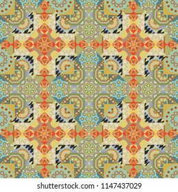 Vector background. Vintage abstract geometric colorful seamless pattern in beige, green and blue colors.