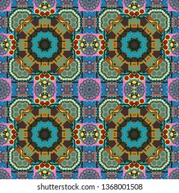 Vector background. Vintage abstract mandala colorful seamless pattern in yellow, blue and brown colors.