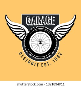 vector badge of motorcycle wheel with wings
