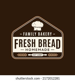 Vector bakery or bread logo on a dark background. Bread shop design template