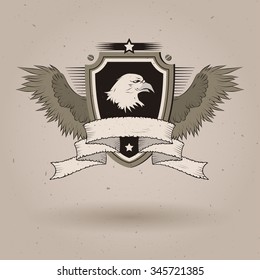 Vector bald eagle head on shield. With tattered banner and wings. 