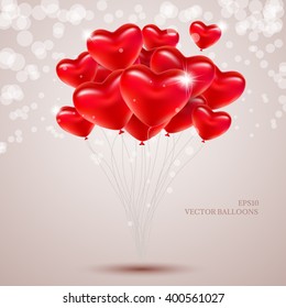 Vector balloons in the form of hearts on a light background.