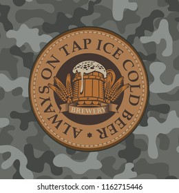 Vector banner for craft beer with a leather label depicting a full beer glass with ears of wheat on a background of camouflage fabric. Always on tap ice cold beer