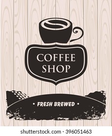vector banner with a cup of coffee on a background texture of wooden boards