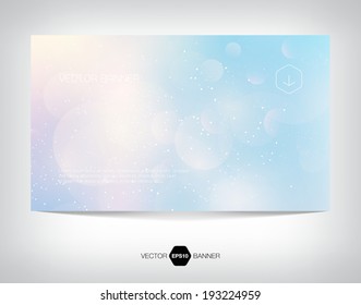 Vector banner with light blue blurry glowing bokeh background and festive glitter. Can be used for a holiday postcard