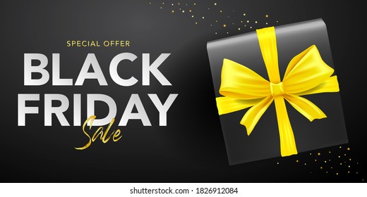vector banner template of box with black ribbons and black friday sale tags in black background. black friday concept