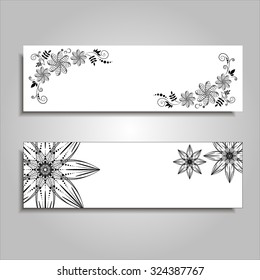 Vector banner templates set with floral elements.