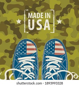 Vector Banner With Words Made In USA And Stylized Sneakers With American Flag Colors On A Camo Background. Suitable For Flyer, Banner, Poster, Price Tag, Label