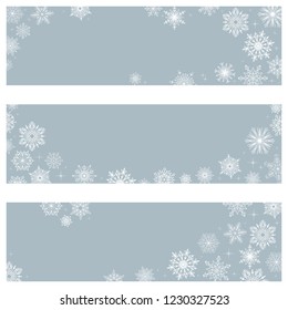 Vector banners snowflakes. On a blue background white snowflakes. Winter ornament.