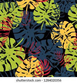 Vector beach seamless pattern wallpaper of grunge bright tropical leaves of palm trees on the black background. Vector seamless pattern. Tropical illustration. Jungle foliage. Cool floral wallpaper