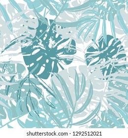 Vector beach seamless pattern wallpaper of cool colored tropical leaves of palm trees on a white background. Vector seamless pattern. Tropical illustration. Jungle foliage. Cool floral wallpaper
