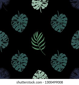 Vector beach seamless pattern wallpaper of blue and green tropical leaves of palm trees on the black background. Vector seamless pattern. Tropical illustration. Jungle foliage. Cool floral wallpaper