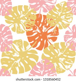 Vector beach seamless pattern wallpaper of autumn colored tropical leaves of palm trees on a white background. Vector seamless pattern. Tropical illustration. Jungle foliage. Cool floral wallpaper