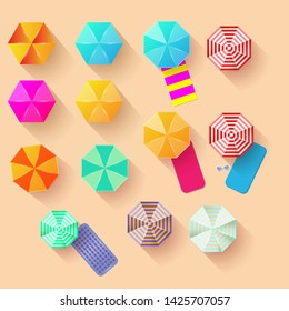 Vector beach sun umbrellas top view set.  parasol collection with different colors isolated on sand background
