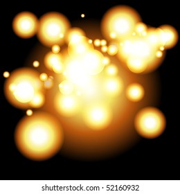 vectorial hermosa luz de desenfoque dorado sobre fondo negro