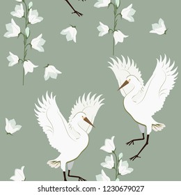 Vector beautiful seamless illustration with birds cranes and field bells on green background. For decoration of textiles, packaging, wallpaper.
