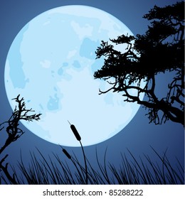 vector big blue moon and silhouettes of tree branches