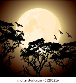 vector big yellow moon and silhouettes of tree branches