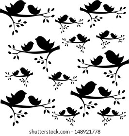 vector bird silhouettes sitting on the branch