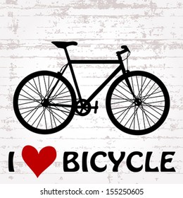 vector black bicycle with a red heart on grunge background