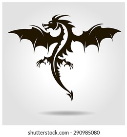 Vector black dragon with wings on a gray background with shadow