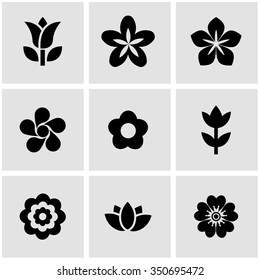 Vector black flowers icon set.