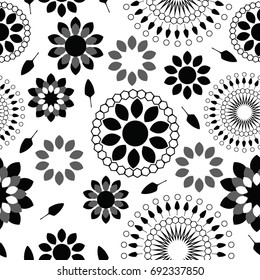 Vector black and gray floral radial pattern.
