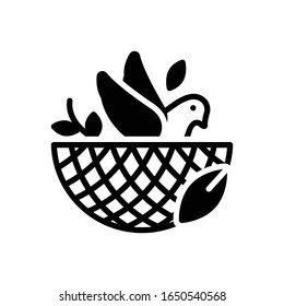 Vector black icon for bird in nest