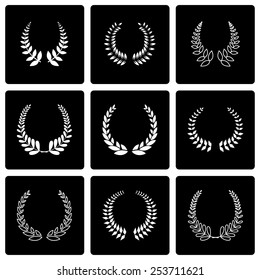 Vector black laurel wreaths icon set on black background.