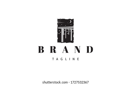Vector black logo on which an abstract image of chopsticks, from which noodles hang, a general view resembles a night city.