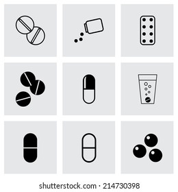 Vector black pills icons set on grey background