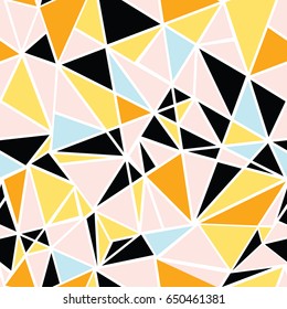 Vector black, pink, blue, and yellow triangles abstract seamless repeat pattern design. Great for modern fabric, wallpaper, scrapbooking, giftwrap, packaging projects.