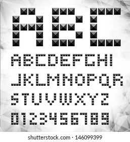 Vector black pixel font with stud / can be used banners, invitation, congratulation or website layout vector/ silver metal stud