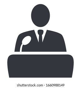 Vector Black Politician Icon - Man In Suit In Front Of Microphone. Debate Symbol.