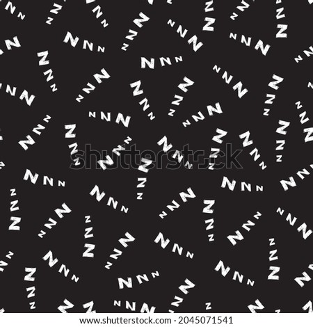 Vector black seamless pattern with scattered cartoon letters z. Suitable for textile, gift wrap and wallpaper.