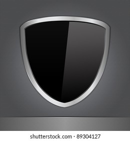 Vector Black Shield on a Metal Background