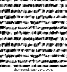 Vector black short lines seamless pattern. Hand drawn tiny brush strokes. Vertical grunge dash stains. Abstract simple geometric background. Memphis style background with small dashes, retro texture