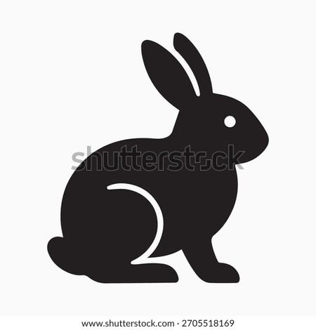 Vector black silhouette of a sitting rabbit isolated on a white background. Side view of a cute bunny with long ears and a rounded tail. This simple flat design is perfect for Easter themes, logos, pe