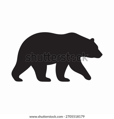 Vector black silhouette of a walking bear isolated on a white background. Side view of a large grizzly or brown bear moving on all fours. This simple flat design is suitable for outdoor logos, wildern
