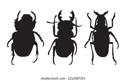 Vector black silhouettes of beetles on a white background