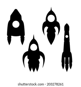 Vector black silhouettes on white background missiles.