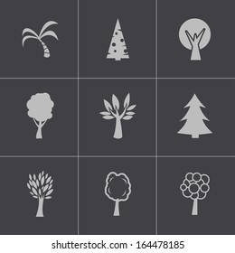 Vector black trees icons set.