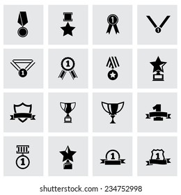 Vector black trophy and awards icon set on grey background
