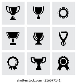 Vector black trophy and awards icons set on grey background