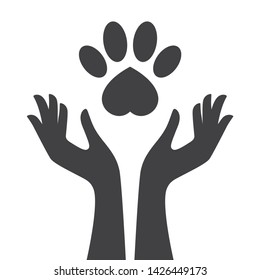 Vector black two female hands catching art heart like footprint of the animal. Isolated on white background