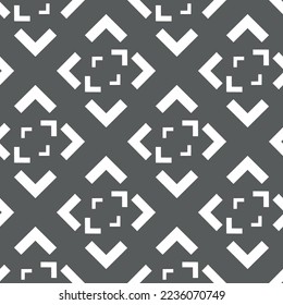 Vector. Black and white abstract ethnic seamless pattern. Background of angle brackets. Mosaic. Design of packaging paper, textile printing, web design, cover, advertising and typographic products.